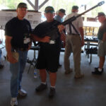 Lonny Holmes and Len Fein-with Barrett .50 Cal rifle at Camp McKall.