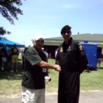 Terry Cagnolatti shakes hands with MSG... who was the Team Sergeant of the Golden Knight Demonstration Team at the SF Picnic.